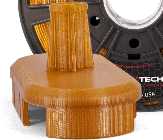 Close-up of a functional part 3D-printed in 3DXTech ThermaX TPI (Natural) showing clean amber polyimide layers