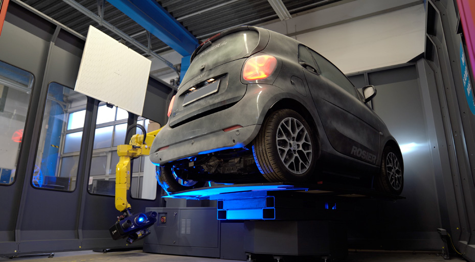 AESUB Violet bulk liquid being applied via spray gun for precision 3D scanning preparation