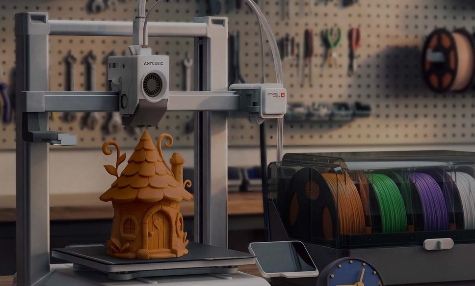 Anycubic Kobra 4 with ACE 2 Pro printing an orange fairy house in a workshop with tools on a pegboard