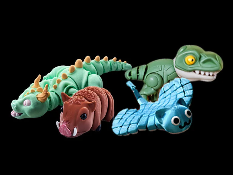 Multicolor articulated dinosaur and animal models printed on the Anycubic Kobra S1 Combo