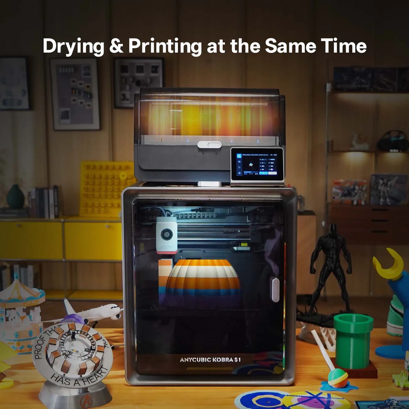 Anycubic Kobra S1 Combo printing unattended on a workbench with on-screen monitoring