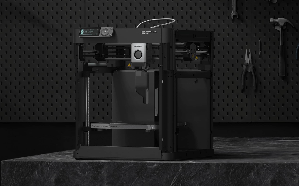 Bambu Lab P1P high-speed CoreXY 3D printer on a dark workshop surface