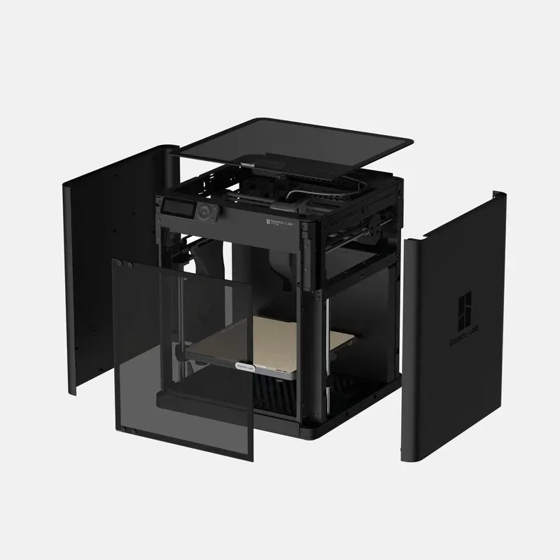 Bambu Lab P1S with its enclosure panels and glass door separated, showing the sealed build chamber