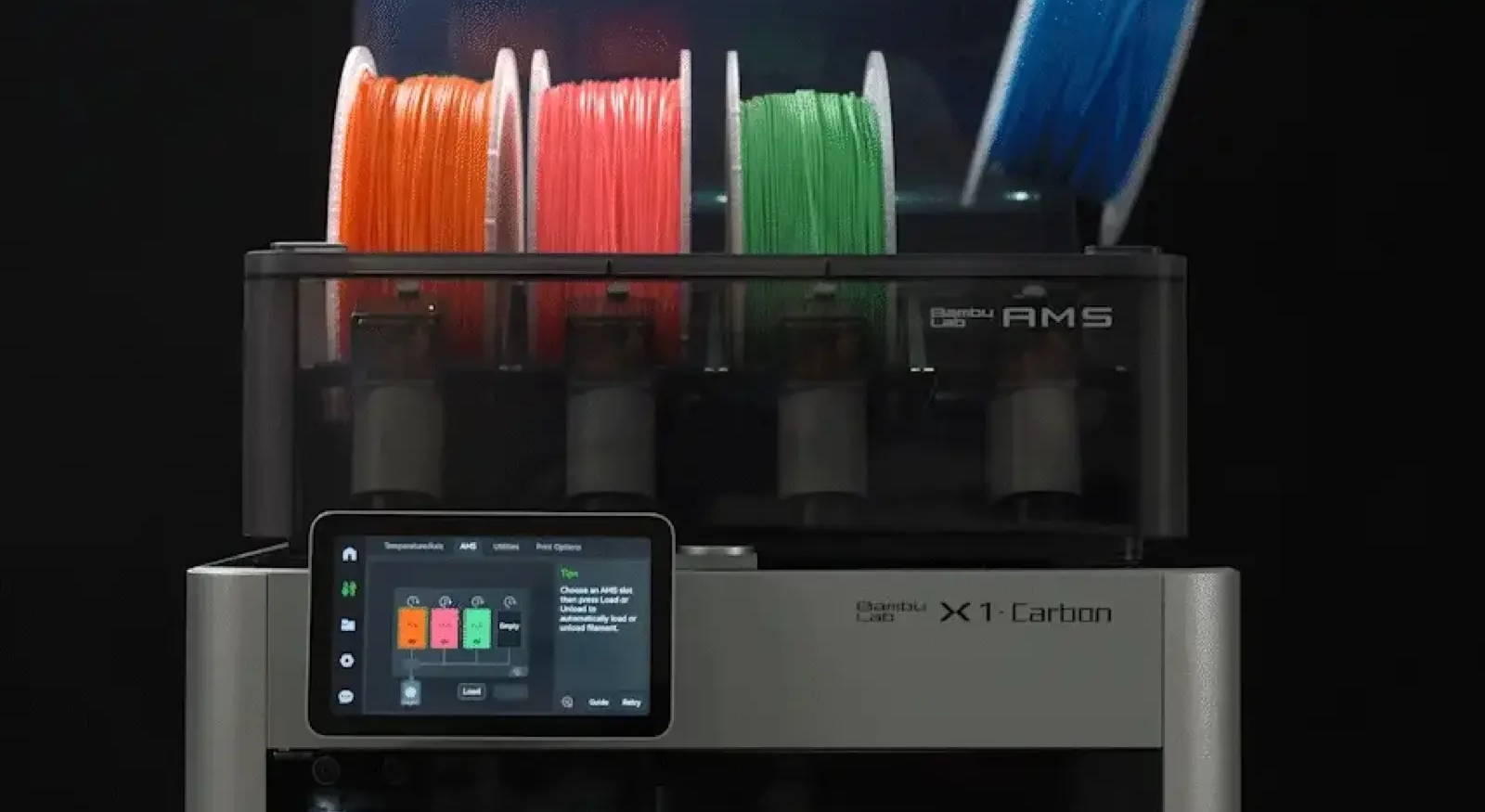 Bambu Lab AMS loaded with four RFID filament spools for automatic multi-color printing