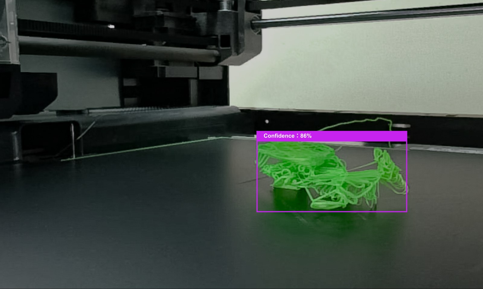 Bambu Lab X1-Carbon AI camera detecting a spaghetti print failure on the plate with a confidence overlay box