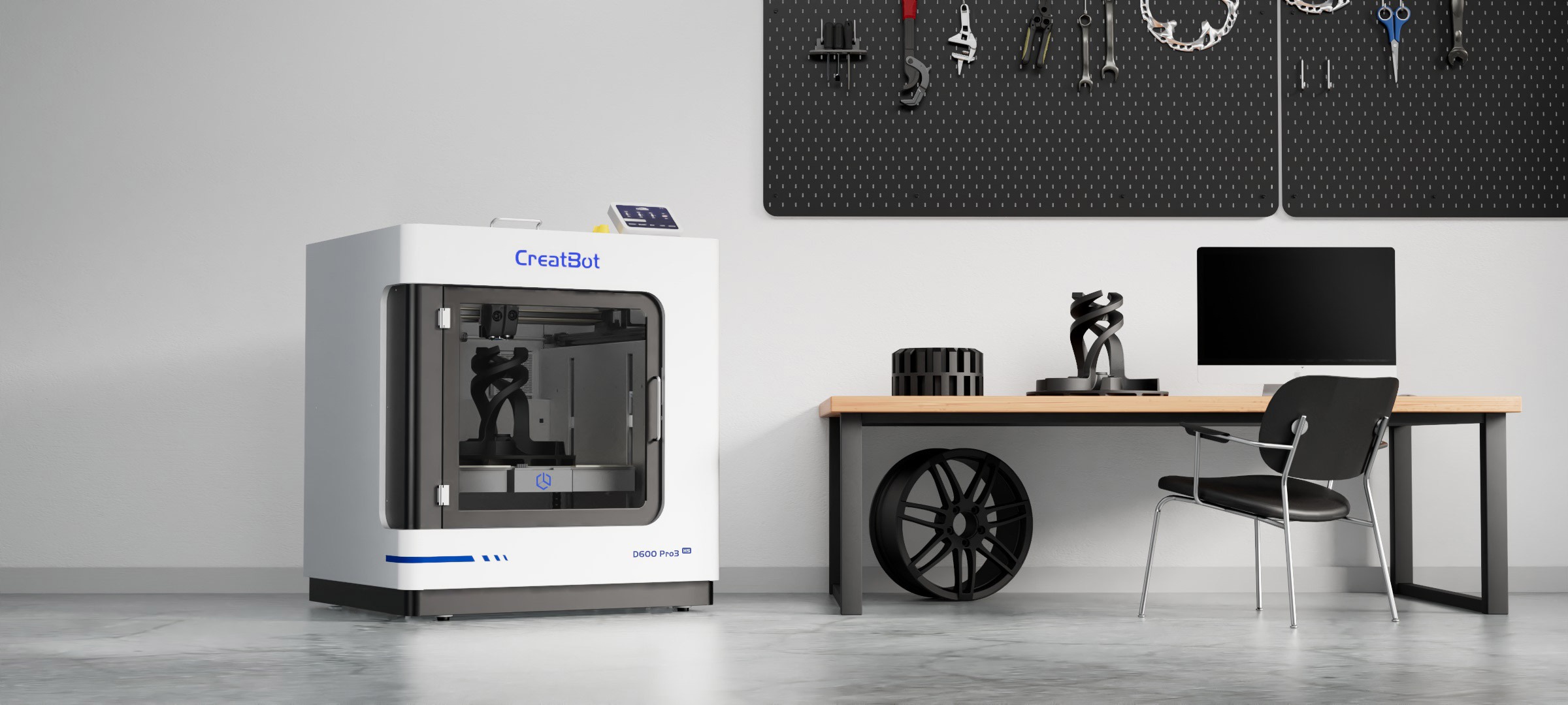 CreatBot D600 Pro 3 HS in a working shop alongside 3D-printed wheels and functional parts