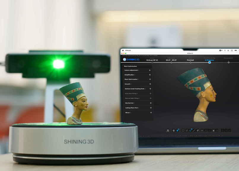 EinScan SP V2 scanning a painted Nefertiti bust with the EXScan S color result shown on a laptop