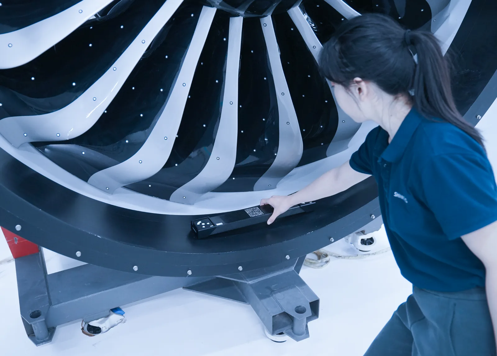 FreeScan Omni inspecting a large aircraft-engine fan assembly on the shop floor