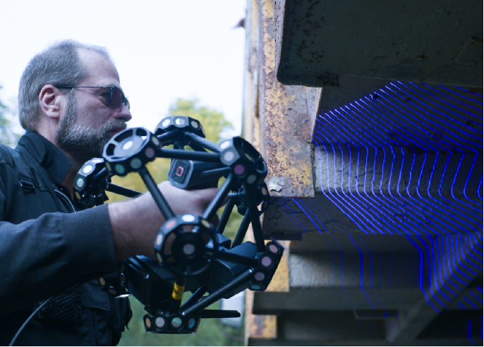 SHINING 3D FreeScan Trak ProW marker-free blue-laser scanning — no coded targets stuck to the part surface