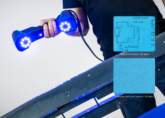 SHINING 3D FreeScan UE Pro blue-laser scan head projecting crossed laser lines on a workpiece