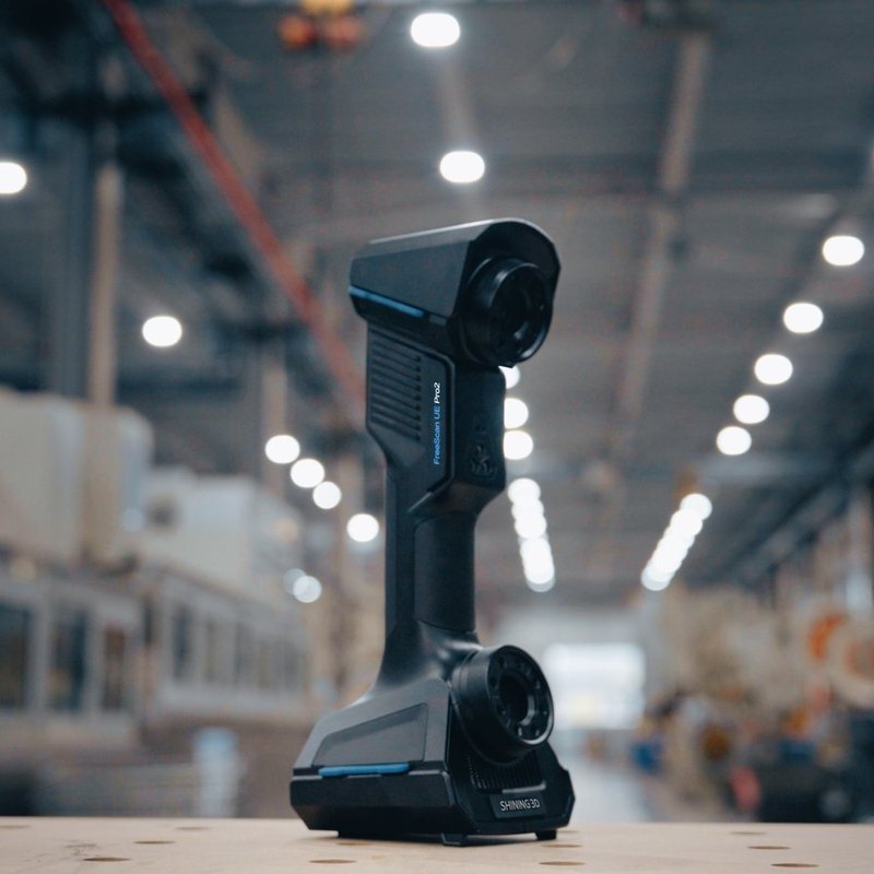 FreeScan UE Pro2 wireless metrology scanner standing on an industrial shop floor