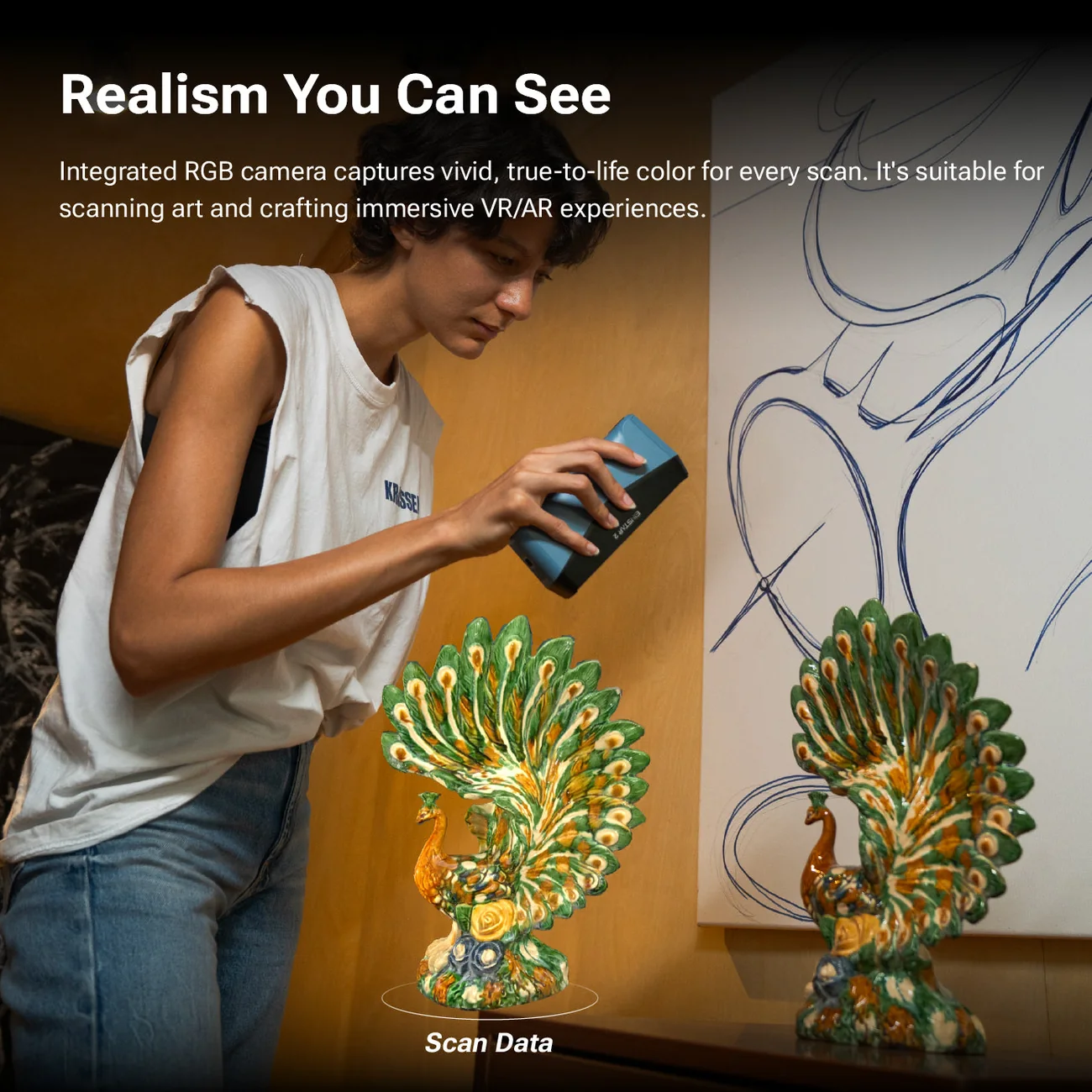 EINSTAR 2 scanning a vivid peacock statue with full-color texture capture