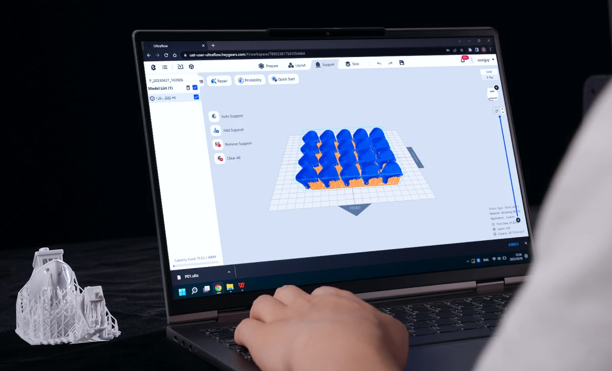 HeyGears slicer software on a laptop preparing supports for a print queued to the Reflex Turbo