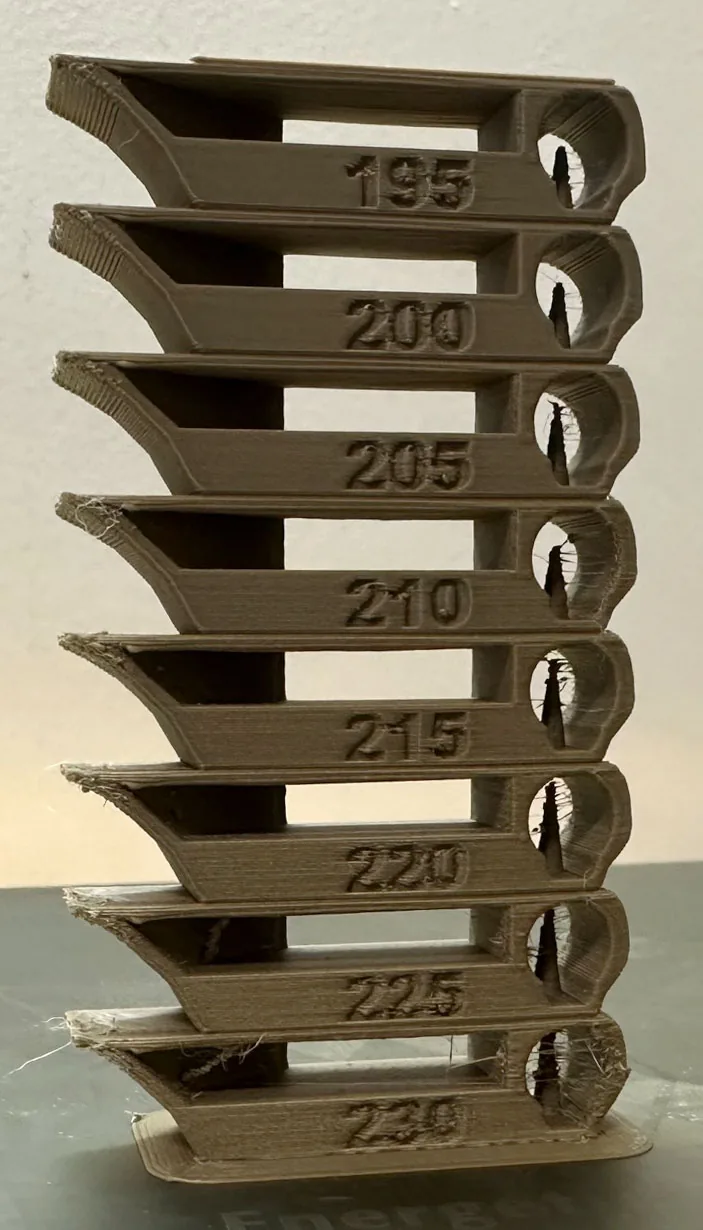 Printed temperature tower from 195 C to 230 C showing stringing differences between layers
