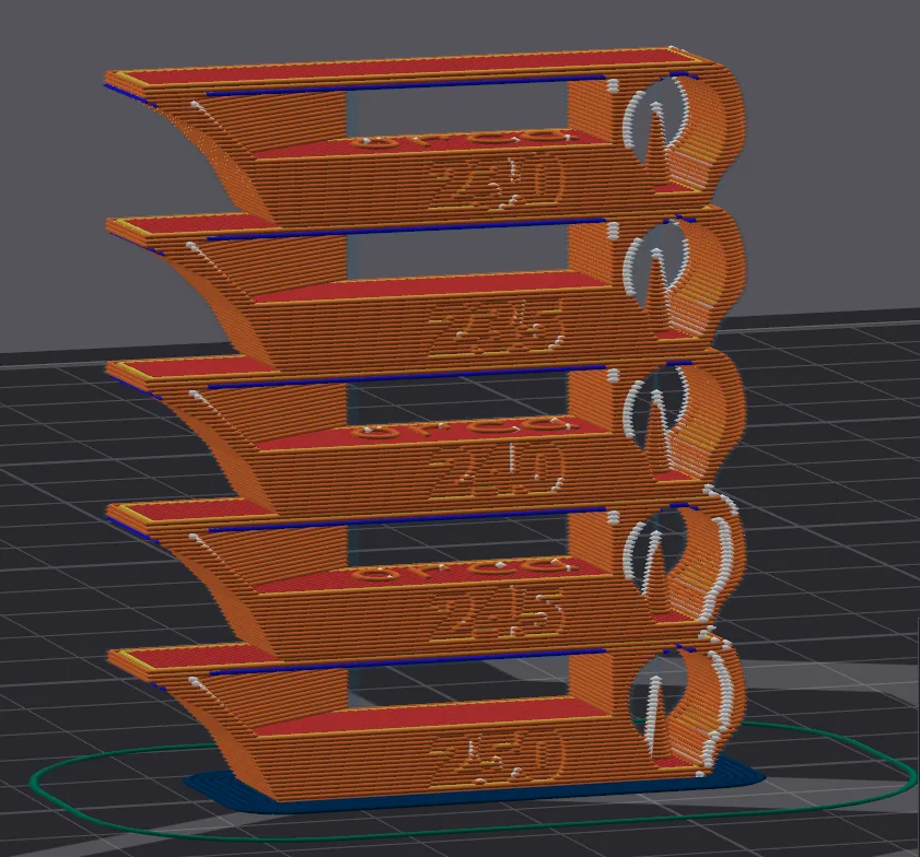 Close-up of the sliced temperature tower layers showing overhang, bridging and hole geometry