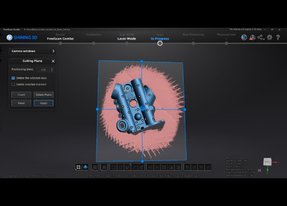 SHINING 3D FreeScan Combo software cutting-plane tool trimming the turntable base from a scanned engine-block mesh