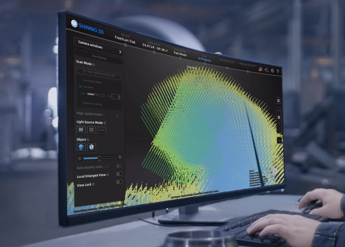 SHINING 3D FreeScan software on a monitor showing a live point-cloud scan during metrology capture