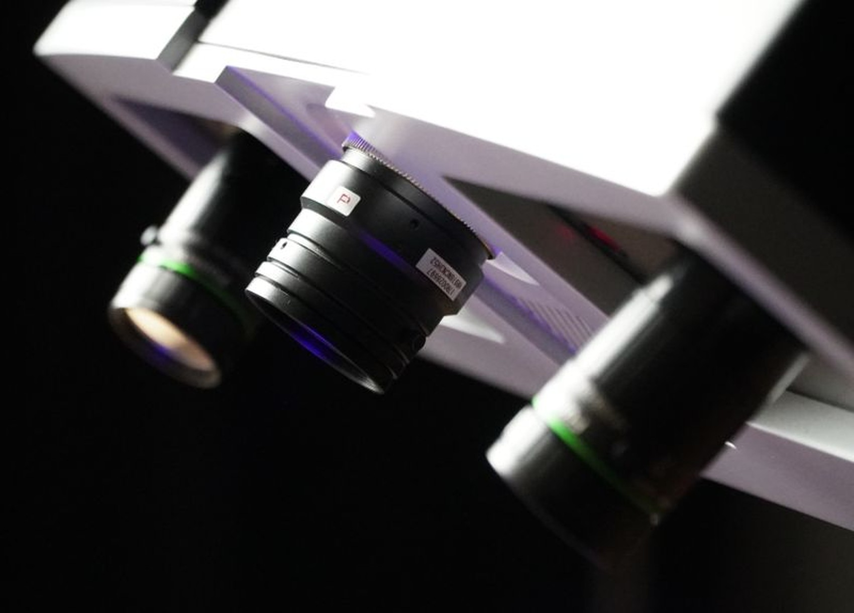 OptimScan 5M Plus three 5 MP camera array with interchangeable industrial lenses under blue LED light