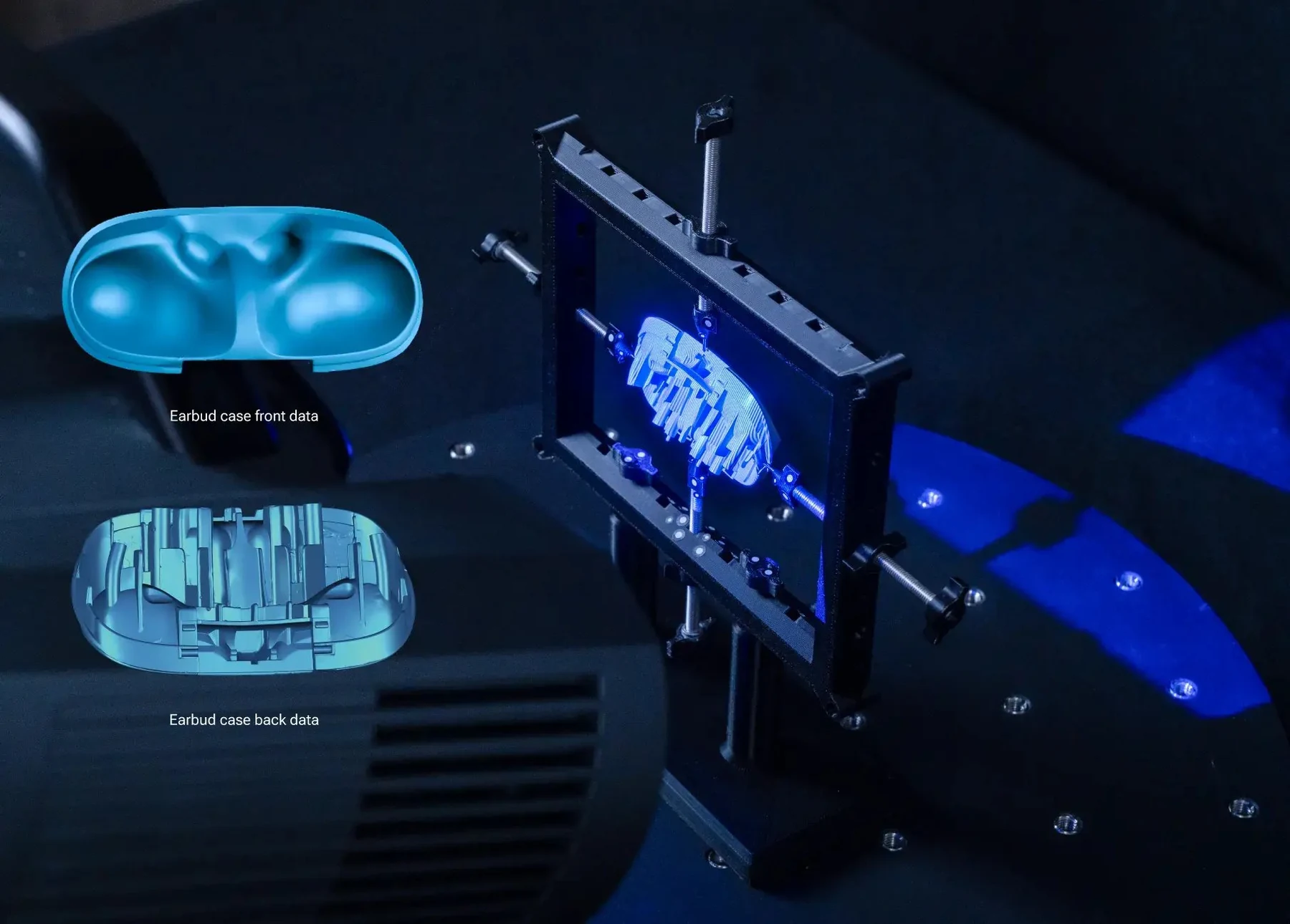 OptimScan Q12 HD scanning an earbud-case mold with MSF &mdash; front and back scan data showing complete coverage in a dark lab