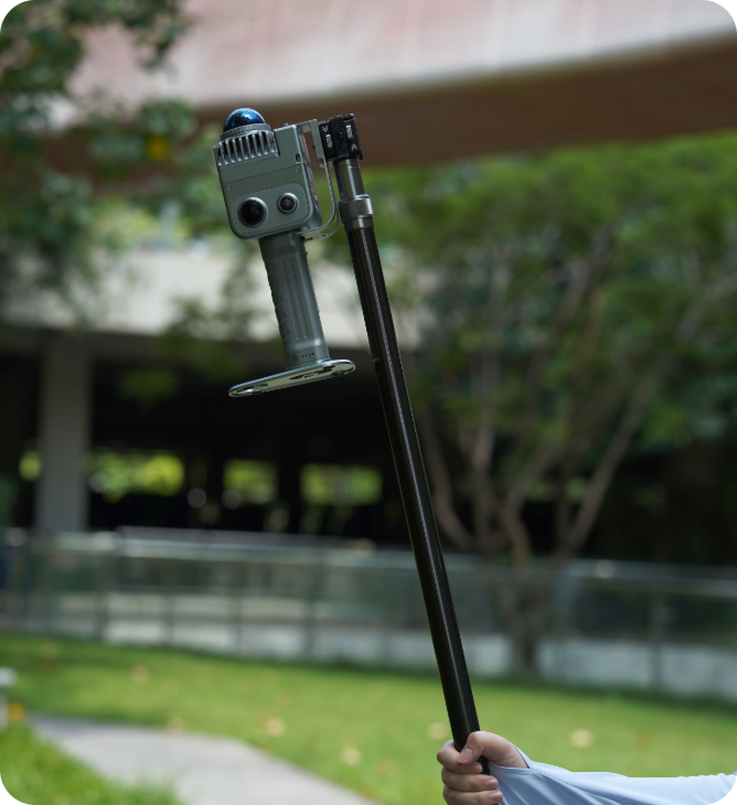 XGRIDS LixelKity K1 raised on the telescopic extension pole accessory for elevated scanning